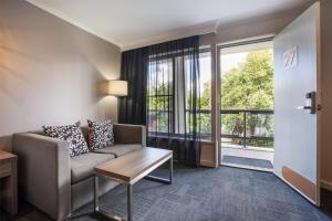 Zona d'estar a Doncaster Apartments by Nightcap Plus