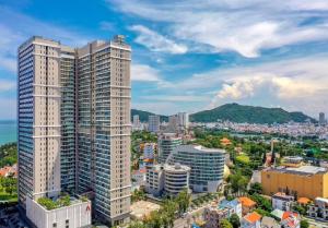 an aerial view of a city with tall buildings at The Sóng Căn Hộ nằm cạnh Biển -An's Homestay in Vung Tau