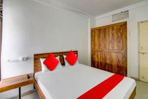 Postel nebo postele na pokoji v ubytování Super Hotel O The Golden Key