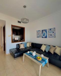 Posezení v ubytování Appartement vue panoramique sur mer à BELLA VISTA