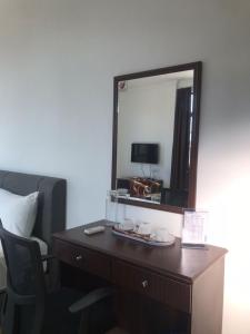 TV a/nebo společenská místnost v ubytování Glistar Hotel