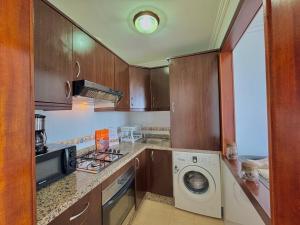 Una cocina o zona de cocina en Appartement vue panoramique sur mer à BELLA VISTA