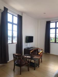TV a/nebo společenská místnost v ubytování Glistar Hotel