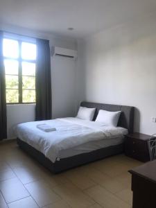 Postel nebo postele na pokoji v ubytování Glistar Hotel