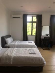 Postel nebo postele na pokoji v ubytování Glistar Hotel