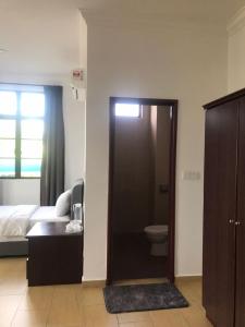 Postel nebo postele na pokoji v ubytování Glistar Hotel