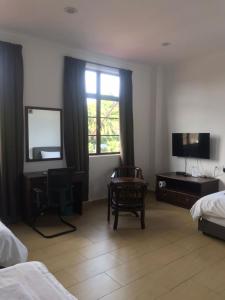 Postel nebo postele na pokoji v ubytování Glistar Hotel