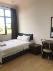 Postel nebo postele na pokoji v ubytování Glistar Hotel