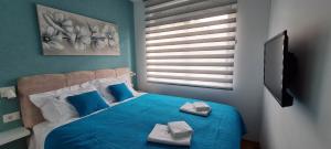 Postel nebo postele na pokoji v ubytování PLAVA ZVEZDA ZLATIBOR apartman u kompleksu Titova vila Zlatibor + 46 fotografií