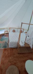 Postel nebo postele na pokoji v ubytování River Glampstay
