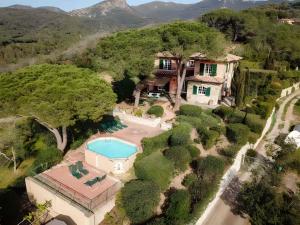 an aerial view of a house with a swimming pool at Holiday home in Portoferraio 23631 in Portoferraio