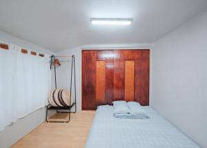 Postel nebo postele na pokoji v ubytování Udo Seaside House