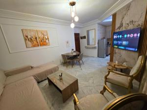 TV a/nebo společenská místnost v ubytování Zen home Lac 2