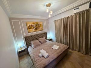 Postel nebo postele na pokoji v ubytování Zen home Lac 2