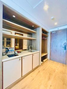 Η κουζίνα ή μικρή κουζίνα στο Khương Lạc Viên Homestay +7 φωτογραφίες