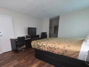 Ένα ή περισσότερα κρεβάτια σε δωμάτιο στο Econo Lodge Lavonia +5 φωτογραφίες