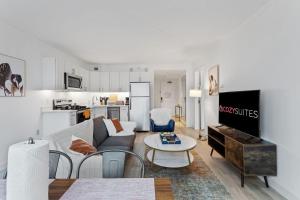 a living room with a couch and a table at Spacious 2BR CozySuites Condo at Showboat #22 in Atlantic City