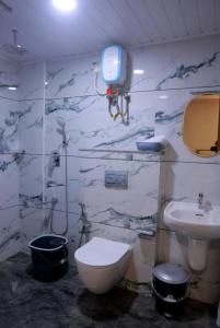 Fotografie z fotogalerie ubytování LAVENDER AiRPORT SUiTE v destinaci Nedumbassery