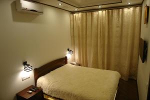 Postel nebo postele na pokoji v ubytování Hotel Sicilia