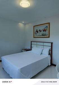 Uma cama ou camas num quarto em EPM Tower Hotel and Events Place