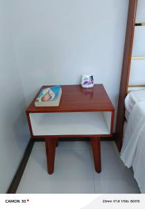 Uma cama ou camas num quarto em EPM Tower Hotel and Events Place