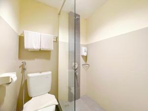 Koupelna v ubytování Noormans Hotel Semarang