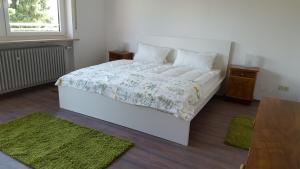 Postel nebo postele na pokoji v ubytování Ferienwohnung & Gästezimmer Rixner