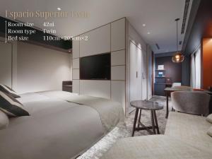 Ένα ή περισσότερα κρεβάτια σε δωμάτιο στο Nagoya Kanko Hotel +126 φωτογραφίες