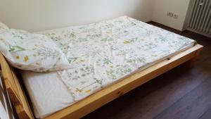 Postel nebo postele na pokoji v ubytování Ferienwohnung & Gästezimmer Rixner