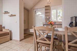 Гостиная зона в Grameno Apartments +14 фотографий