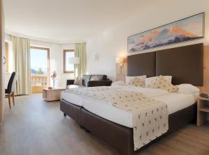 A bed or beds in a room at Hotel Venetblick