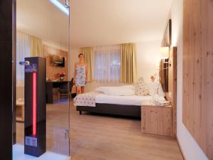 A bed or beds in a room at Hotel Venetblick
