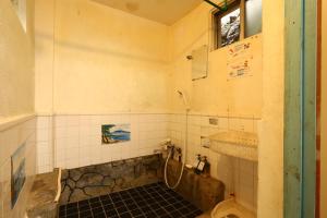 Afbeelding uit fotogalerij van ごーやー荘 in Okinawa City