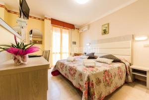 Posteľ alebo postele v izbe v ubytovaní Hotel Marco Polo