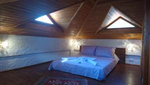 Postel nebo postele na pokoji v ubytování Şirince Klaseas Hotel&Restaurant