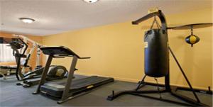 a gym with several exercise bikes in a room at Royalton Inn & Suites Upper Sandusky in Upper Sandusky