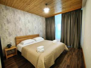 Postel nebo postele na pokoji v ubytování Lastili Inn Hotel