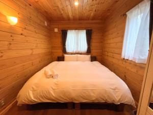 Katil atau katil-katil dalam bilik di HAL Cottage