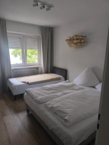 Ένα ή περισσότερα κρεβάτια σε δωμάτιο στο Apartment Rosa