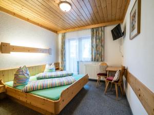 Posteľ alebo postele v izbe v ubytovaní Apartment in Saalbach-Hinterglemm near Ski Area