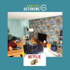 TV a/nebo společenská místnost v ubytování Superbe appart cosy, balcon, parking
