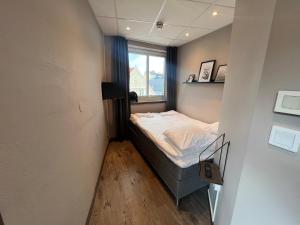 Voodi või voodid majutusasutuse Karlskrona H&H toas