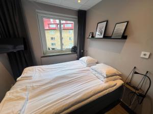 Voodi või voodid majutusasutuse Karlskrona H&H toas