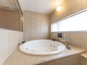 Koupelna v ubytování HOTEL felice Osaka -伊丹空港-