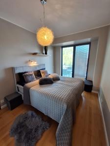 Voodi või voodid majutusasutuse Kodurahu apartement toas