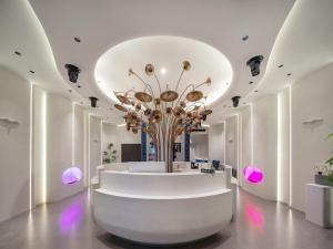 Fotografie z fotogalerie ubytování 西度国际酒店义乌国际商贸城店 v destinaci Xialuozhai