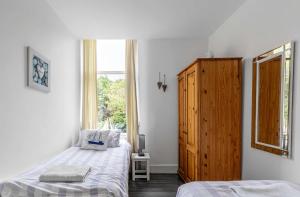 Katil atau katil-katil dalam bilik di The Hidden Asset- Rothesay, Isle of Bute