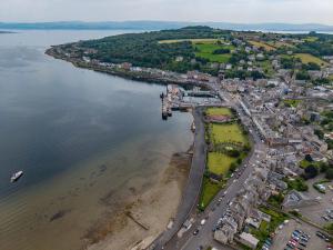 an aerial view of a town next to the water at The Hidden Asset- Rothesay, Isle of Bute in Rothesay