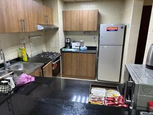 مطبخ أو مطبخ صغير في Apartment in Ajman