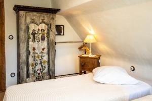 La maison alsacienneにあるベッド